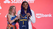 Apr 10, 2023; New York, NY, USA; Former Gamecock Aliyah Boston poses for a photo with WNBA Commissioner Cathy Engelbert after being drafted No. 1 overall by the Indiana Fever at the 2023 WNBA Draft