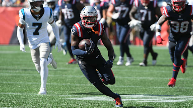 New England Patriots wide receiver Stefon Diggs (8) runs with the ball.