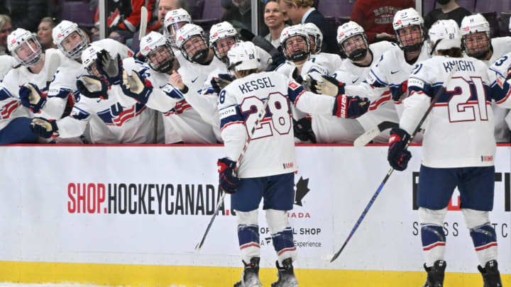 Apr 15, 2023; Brampton, Ontario, CAN;   USA forward Amanda Kessel (28) celebrates with team mates at the bench after scoring a goal against Czechia in the first period at CAA Center. Mandatory Credit: Dan Hamilton-USA TODAY Sports