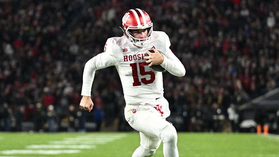 Fernando Mendoza runs the ball