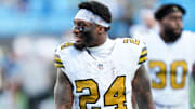 Nov 9, 2025; Charlotte, North Carolina, USA; New Orleans Saints running back Devin Neal (24) looks on after the game against the Carolina Panthers at Bank of America Stadium. 