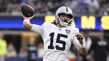 Oct 20, 2024; Inglewood, California, USA;  Las Vegas Raiders quarterback Gardner Minshew (15) throws downfield against the Los Angeles Rams in the second half at SoFi Stadium. Mandatory Credit: Alex Gallardo-Imagn Images