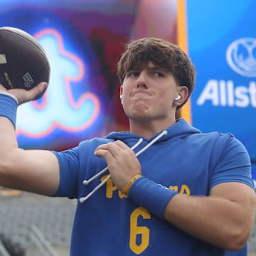 Oct 25, 2025; Pittsburgh, Pennsylvania, USA; Pittsburgh Panthers quarterback Mason Heintschel (6) warms up before the game against the North Carolina State Wolfpack at Acrisure Stadium. Mandatory Credit: Charles LeClaire-Imagn Images