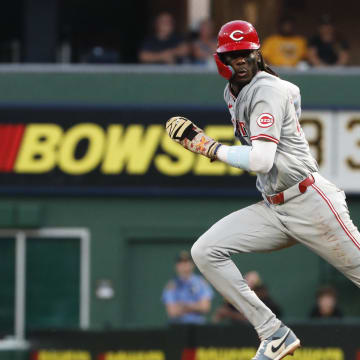 Jun 18, 2024; Pittsburgh, Pennsylvania, USA;  Cincinnati Reds shortstop Elly De La Cruz (44) runs on a steal attempt against the Pittsburgh Pirates during the eighth inning at PNC Park. The Reds won 2-1. Mandatory Credit: Charles LeClaire-USA TODAY Sports