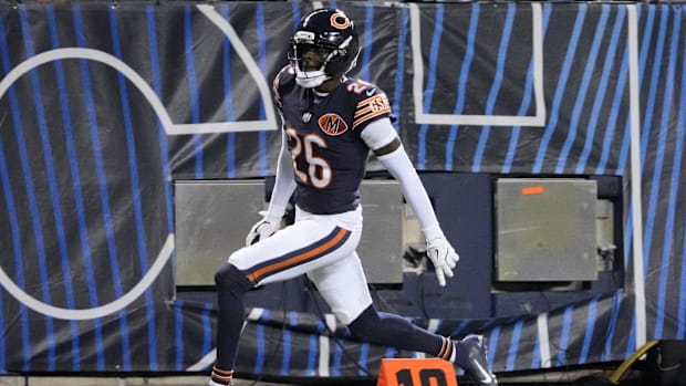 Bears cornerback Nahshon Wright ) returns an interception for a touchdown against the Minnesota Vikings