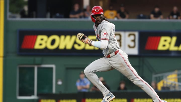 Jun 18, 2024; Pittsburgh, Pennsylvania, USA;  Cincinnati Reds shortstop Elly De La Cruz (44) runs on a steal attempt against the Pittsburgh Pirates during the eighth inning at PNC Park. The Reds won 2-1. Mandatory Credit: Charles LeClaire-USA TODAY Sports