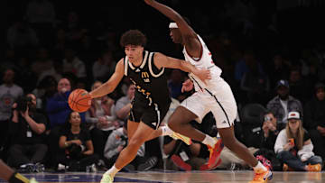 Apr 1, 2025; Brooklyn, NY, USA; Duke basketball forward Cameron Boozer (12) dribbles the ball against McDonald's All American West forward AJ Dybantsa (3) during the second half of the game at Barclays Center.