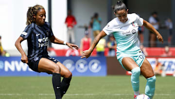 Kansas City Current midfielder Debinha (99) controls the ball against Washington Spirit defender Casey Krueger (3)