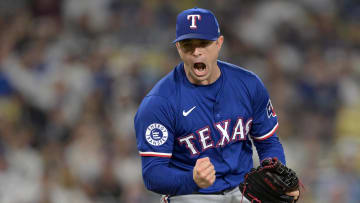 Jun 13, 2024; Los Angeles, California, USA;  Texas Rangers relief pitcher David Robertson (37) reacts after striking out Los Angeles Dodgers shortstop Mookie Betts (50), designated hitter Shohei Ohtani (17) and first baseman Freddie Freeman (5) in the eighth inning at Dodger Stadium. Mandatory Credit: Jayne Kamin-Oncea-USA TODAY Sports