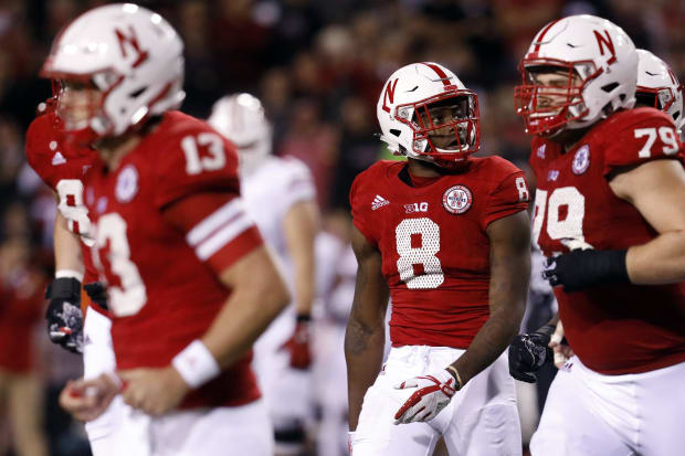 Nebraska Cornhuskers wide receiver Stanley Morgan Jr. looks at the scoreboard replay after his fumble was recovered.