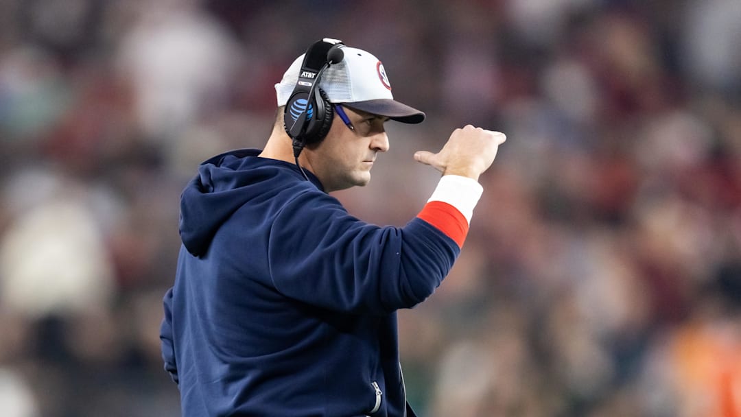 Jan 8, 2026; Glendale, AZ, USA; Mississippi Rebels quarterbacks coach Joe Judge against the Miami Hurricanes during the 2026 Fiesta Bowl and semifinal game of the College Football Playoff at State Farm Stadium. Mandatory Credit: Mark J. Rebilas-Imagn Images