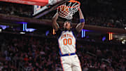 Nov 30, 2025; New York, New York, USA;  New York Knicks guard Jordan Clarkson (00) dunks in the fourth quarter against the Toronto Raptors at Madison Square Garden. Mandatory Credit: Wendell Cruz-Imagn Images