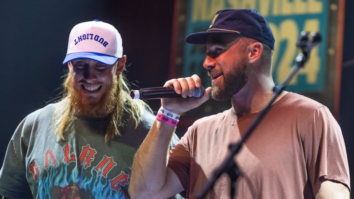 George Kittle and Travis Kelce greet the crowd during the “Tight Ends & Friends” concert at Brooklyn Bowl Tuesday, June 18, 2024 in Nashville, Tenn.
