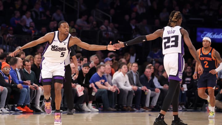 Apr 4, 2024; New York, New York, USA; Sacramento Kings guard De'Aaron Fox (5) celebrates his three point shot against the New York Knicks with guard Keon Ellis (23) during the first quarter at Madison Square Garden. Mandatory Credit: Brad Penner-USA TODAY Sports