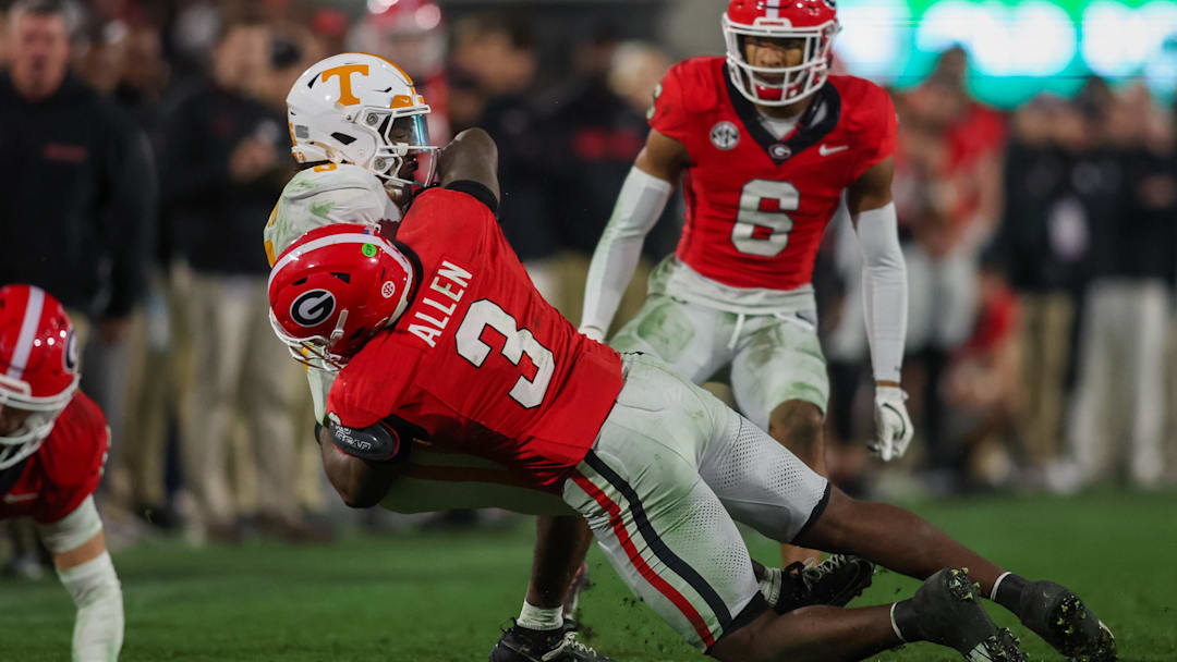Nov 16, 2024; Athens, Georgia, USA; Tennessee Volunteers running back Dylan Sampson (6) is tackled by Georgia Bulldogs linebacker CJ Allen (3) in the third quarter at Sanford Stadium. Mandatory Credit: Brett Davis-Imagn Images