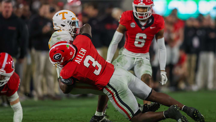 Nov 16, 2024; Athens, Georgia, USA; Tennessee Volunteers running back Dylan Sampson (6) is tackled by Georgia Bulldogs linebacker CJ Allen (3) in the third quarter at Sanford Stadium. Mandatory Credit: Brett Davis-Imagn Images