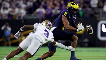 Jan 8, 2024; Houston, TX, USA; Michigan Wolverines wide receiver Cornelius Johnson (6) miss a pass against Washington Huskies safety Mishael Powell (3) during the fourth quarter in the 2024 College Football Playoff national championship game at NRG Stadium. Mandatory Credit: Troy Taormina-USA TODAY Sports