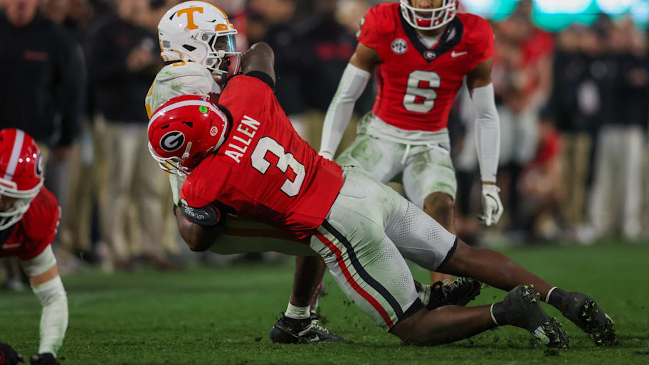 Tennessee Volunteers running back Dylan Sampson is tackled by Georgia Bulldogs linebacker CJ Allen. Mandatory Credit: Brett Davis-Imagn Images | Brett Davis-Imagn Images