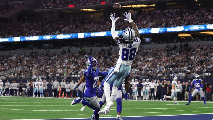 Nov 30, 2023; Arlington, Texas, USA; Dallas Cowboys wide receiver CeeDee Lamb (88) catches a pass for a touchdown against the Seattle Seahawks during the first half at AT&T Stadium. 