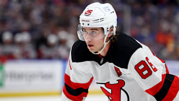 Feb 2, 2025; Buffalo, New York, USA;  New Jersey Devils center Jack Hughes (86) waits for the face-off during the third period against the Buffalo Sabres at KeyBank Center. Mandatory Credit: Timothy T. Ludwig-Imagn Images
