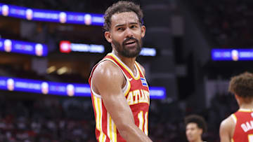 Atlanta Hawks guard Trae Young reacts towards a fan during the second quarter against the Houston Rockets at Toyota Center.