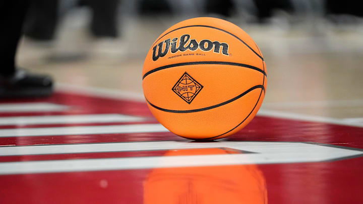 A Wilson NIT basketball sits on the court. A Wilson NIT basketball sits on the court.