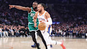 New York Knicks guard Jalen Brunson drives past Boston Celtics guard Jaylen Brown at Madison Square Garden. 