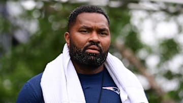 Jul 24, 2024; Foxborough, MA, USA;  New England Patriots head coach Jerod Mayo walks to the podium for a press conference before training camp at Gillette Stadium. Mandatory Credit: Eric Canha-USA TODAY Sports