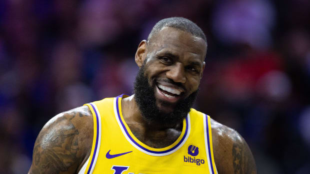 Los Angeles Lakers forward LeBron James smiles after a Philadelphia 76ers foul.