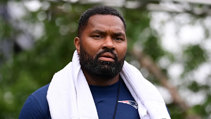 Jul 24, 2024; Foxborough, MA, USA;  New England Patriots head coach Jerod Mayo walks to the podium for a press conference before training camp at Gillette Stadium. Mandatory Credit: Eric Canha-USA TODAY Sports