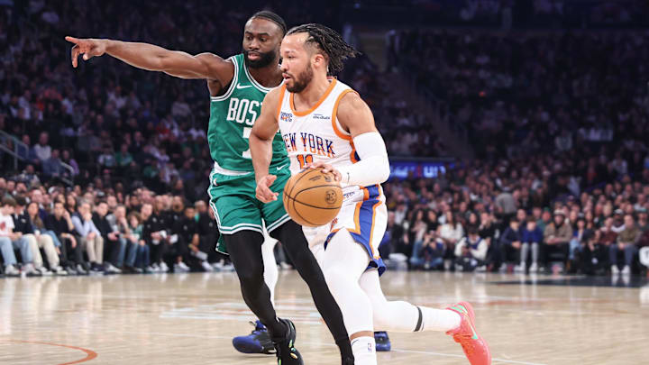 New York Knicks guard Jalen Brunson drives past Boston Celtics guard Jaylen Brown at Madison Square Garden. 