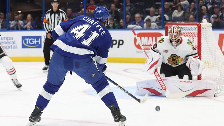 Oct 23, 2025; Tampa, Florida, USA; Tampa Bay Lightning right wing Mitchell Chaffee (41) shoots as Chicago Blackhawks goaltender Spencer Knight (30) makes a save during the first period at Benchmark International Arena. Oct 23, 2025; Tampa, Florida, USA; Tampa Bay Lightning right wing Mitchell Chaffee (41) shoots as Chicago Blackhawks goaltender Spencer Knight (30) makes a save during the first period at Benchmark International Arena.