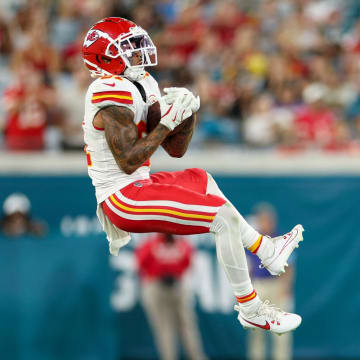 Aug 10, 2024; Jacksonville, Florida, USA; Kansas City Chiefs wide receiver Nikko Remigio (81) makes a catch against the Jacksonville Jaguars in the third quarter during preseason at EverBank Stadium. Mandatory Credit: Nathan Ray Seebeck-USA TODAY Sports