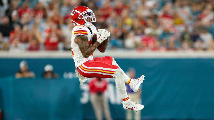 Aug 10, 2024; Jacksonville, Florida, USA; Kansas City Chiefs wide receiver Nikko Remigio (81) makes a catch against the Jacksonville Jaguars in the third quarter during preseason at EverBank Stadium. Mandatory Credit: Nathan Ray Seebeck-USA TODAY Sports