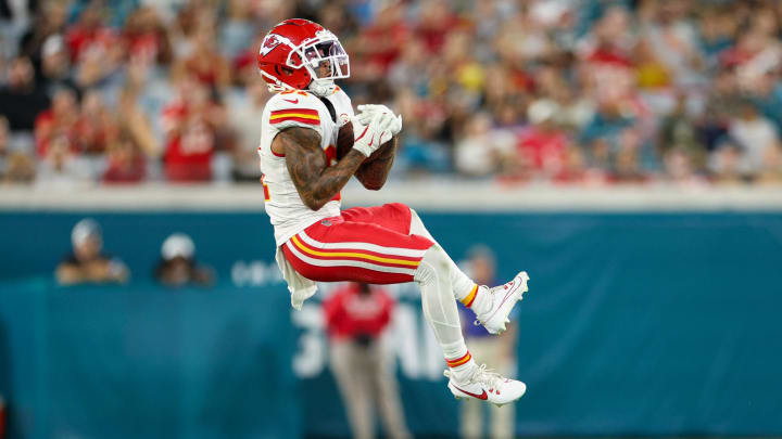 Aug 10, 2024; Jacksonville, Florida, USA; Kansas City Chiefs wide receiver Nikko Remigio (81) makes a catch against the Jacksonville Jaguars in the third quarter during preseason at EverBank Stadium. Mandatory Credit: Nathan Ray Seebeck-USA TODAY Sports