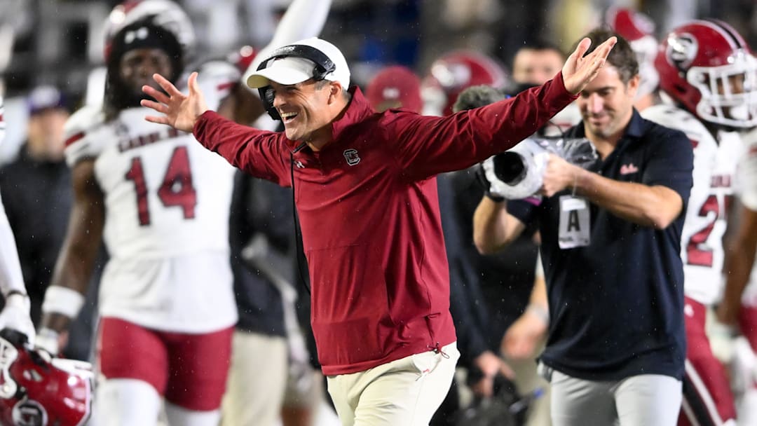 Nov 9, 2024; Nashville, Tennessee, USA;  South Carolina Gamecocks head coach Shane Beamer celebrates the win with defensive back Vicari Swain (4) against the Vanderbilt Commodores during the second half at FirstBank Stadium. Mandatory Credit: Steve Roberts-Imagn Images