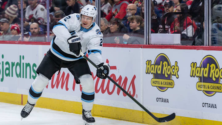 Jan 26, 2025; Ottawa, Ontario, CAN; Utah defenseman Olli Maatta (2) shoots the puck in the first period against the Ottawa Senators at the Canadian Tire Centre. Mandatory Credit: Marc DesRosiers-Imagn Images Jan 26, 2025; Ottawa, Ontario, CAN; Utah defenseman Olli Maatta (2) shoots the puck in the first period against the Ottawa Senators at the Canadian Tire Centre. Mandatory Credit: Marc DesRosiers-Imagn Images