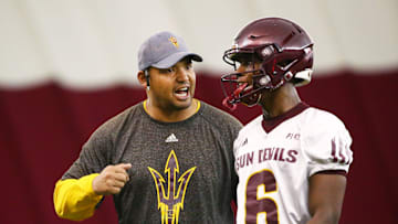 Arizona State Sun Devils coach Tony White talks to defensive back Timarcus Davis (6) during spring football practice on Feb. 6 in Tempe.

Arizona State spring football practice