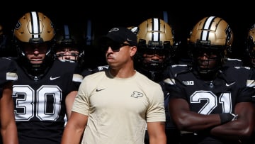 Purdue Boilermakers coach Ryan Walters waits to take the field 