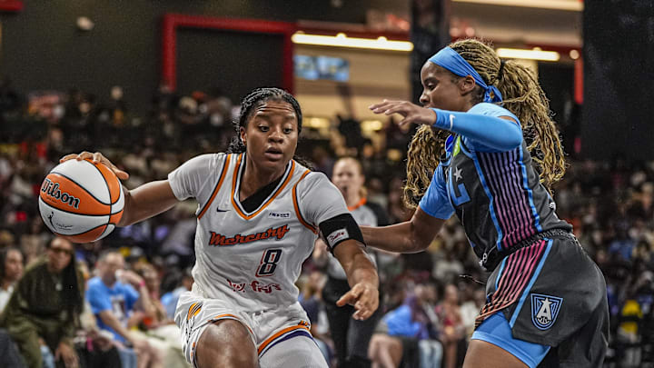 Aug 1, 2025; College Park, Georgia, USA; Phoenix Mercury guard Monique Akoa Makani (8) dribbles against Atlanta Dream guard Jordin Canada (3) during the second half at Gateway Center Arena at College Park. Mandatory Credit: Dale Zanine-Imagn Images Aug 1, 2025; College Park, Georgia, USA; Phoenix Mercury guard Monique Akoa Makani (8) dribbles against Atlanta Dream guard Jordin Canada (3) during the second half at Gateway Center Arena at College Park. Mandatory Credit: Dale Zanine-Imagn Images