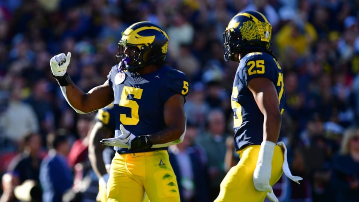 Jan 1, 2024; Pasadena, CA, USA; Michigan Wolverines defensive end Josaiah Stewart (5) celebrates after sacking Alabama Crimson Tide quarterback Jalen Milroe (4) in the first quarter in the 2024 Rose Bowl college football playoff semifinal game at Rose Bowl. Mandatory Credit: Gary A. Vasquez-USA TODAY Sports