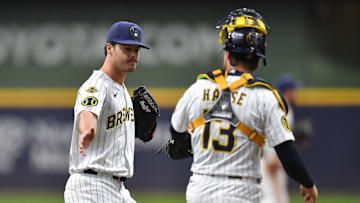 Apr 20, 2025; Milwaukee, Wisconsin, USA; Milwaukee Brewers starting pitcher Logan Henderson (43) celebrates with catcher Eric Haase (13) in his MLB debut during a game against the Athletics at American Family Field. Mandatory Credit: Patrick Gorski-Imagn Images