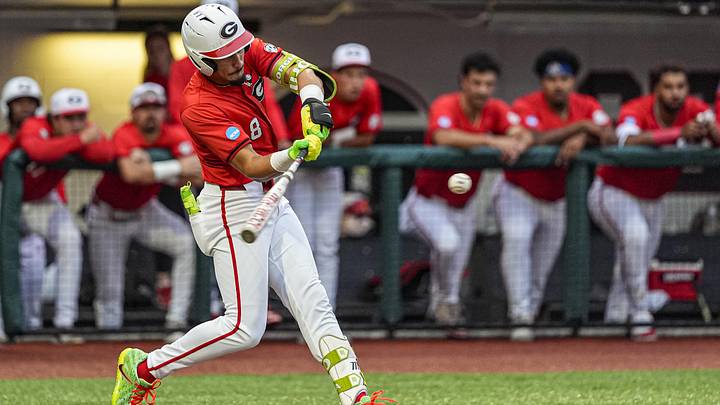 May 31, 2026; Athens, GA, USA; Georgia Bulldogs infielder Rylan Lujo (8) drives in two runs with a base hit against the Liberty Flames during the eighth inning at Foley Field. Mandatory Credit: Dale Zanine-Imagn Images