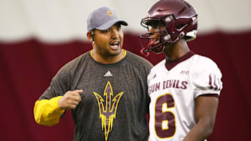 Arizona State Sun Devils coach Tony White talks to defensive back Timarcus Davis (6) during spring football practice on Feb. 6 in Tempe.

Arizona State spring football practice