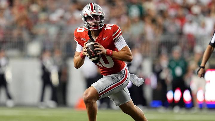 Ohio State Buckeyes quarterback Julian Sayin (10) runs during the first half of the NCAA football game against the Ohio Bobcats at Ohio Stadium on Sept. 13, 2025.