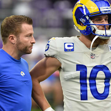Dec 26, 2021; Minneapolis, Minnesota, USA; Los Angeles Rams head coach Sean McVay and wide receiver Cooper Kupp (10) look on before the game against the Minnesota Vikings at U.S. Bank Stadium. Mandatory Credit: Jeffrey Becker-Imagn Images