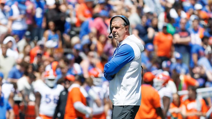 Apr 12, 2025; Gainesville, FL, USA; Florida Gators head coach Billy Napier looks on during the first half at Ben Hill Griffin Stadium. Mandatory Credit: Matt Pendleton-Imagn Images Apr 12, 2025; Gainesville, FL, USA; Florida Gators head coach Billy Napier looks on during the first half at Ben Hill Griffin Stadium. Mandatory Credit: Matt Pendleton-Imagn Images