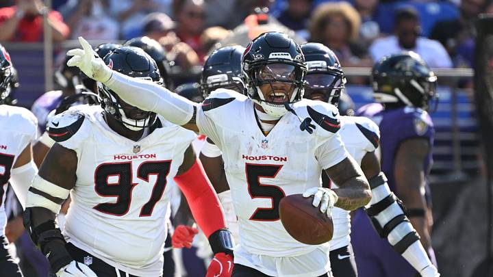 Oct 5, 2025; Baltimore, Maryland, USA; Houston Texans safety Jalen Pitre (5) celebrates a fumble recovery during the fourth quarter against the Baltimore Ravens at M&T Bank Stadium. Mandatory Credit: Rafael Suanes-Imagn Images