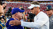 LSU head coach Brian Kelly and Ole Miss head coach Lane Kiffin shake hands after a college football game between Ole Miss and LSU at Vaught-Hemingway Stadium in Oxford, Miss., on Saturday, Sept. 27, 2025. Ole Miss defeated LSU 24-19.