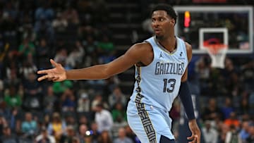 Mar 31, 2025; Memphis, Tennessee, USA; Memphis Grizzlies forward Jaren Jackson Jr. (13) reacts after a three point basket during the third quarter against the Boston Celtics at FedExForum. Mandatory Credit: Petre Thomas-Imagn Images